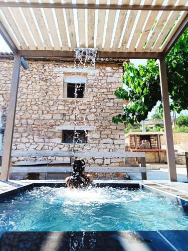 Corinth House | Agios Ioannis Stone Cottage with Private Heated Pool & Hydro-massage