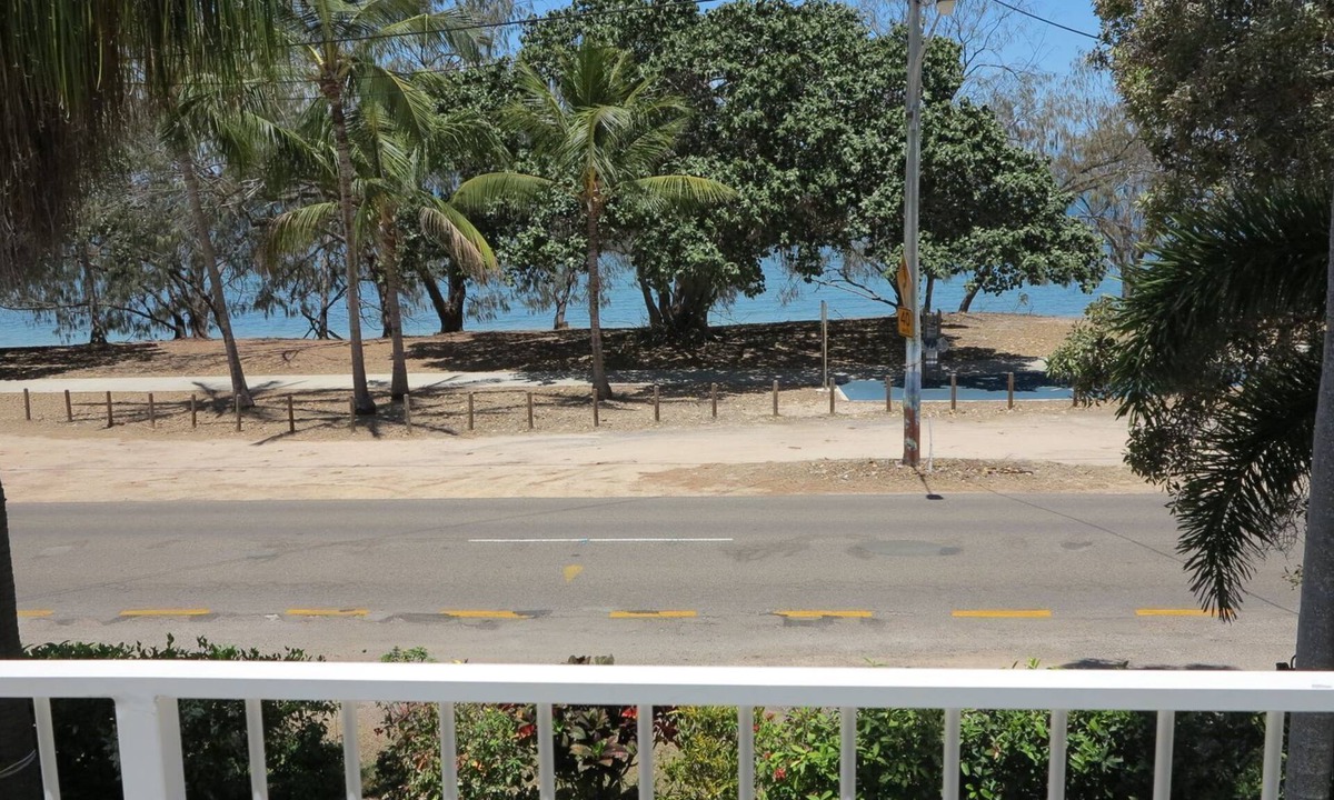 Arcadia Apartment | Arcadia Beach Unit 4 - Charming sunny apartment with front row balcony view over Geoffrey Bay