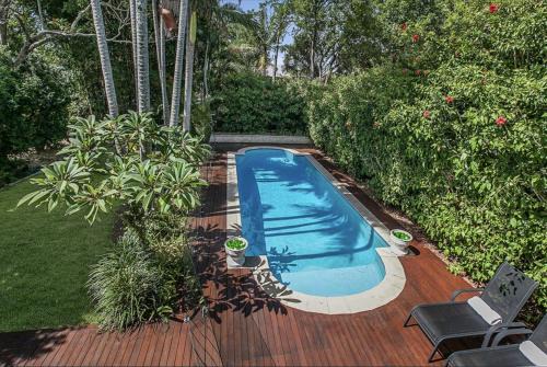 Wooloowin House | Family Friendly, Pool, 9km to City by Custom Bnb Hosting