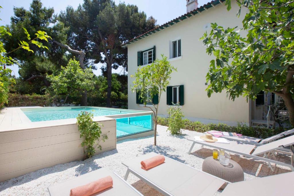 Glyfada Villa | Glyfada Villa 6BR 16ppl Private Pool 300m to Beach