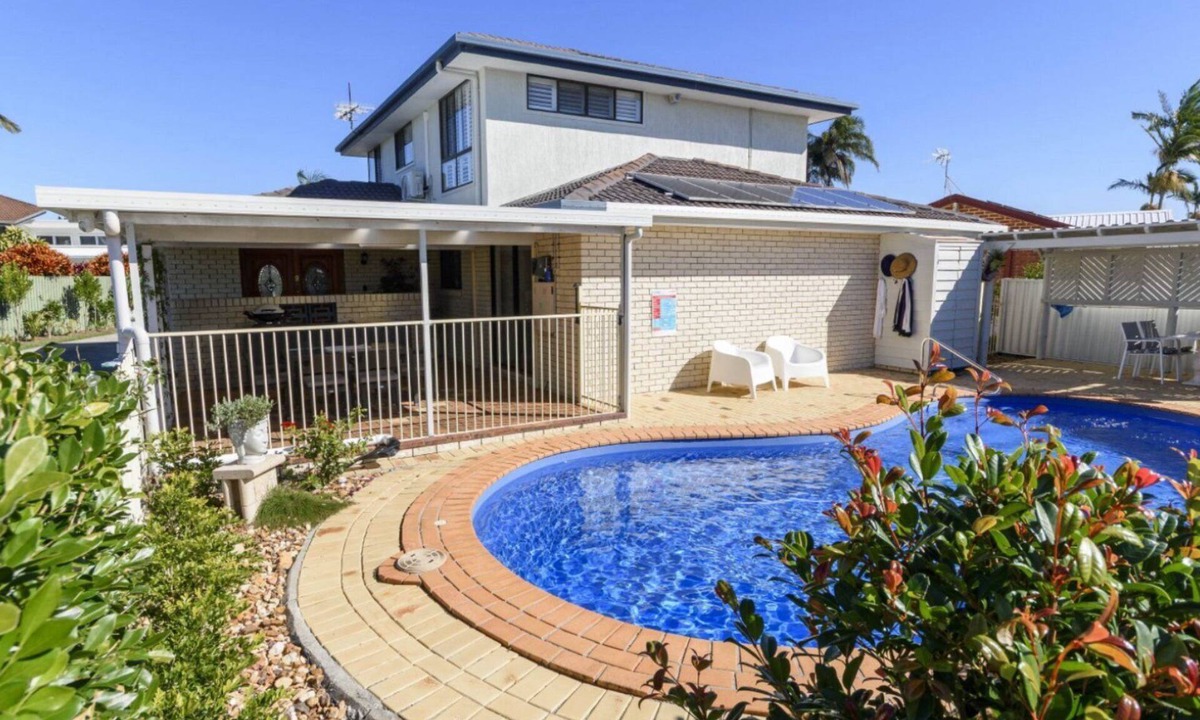 Sandstone Point House | Relax & Unwind: Poolside Paradise