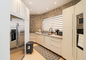 Elegant condo with private pool, AC, lanai with resort pool view - walk to beach