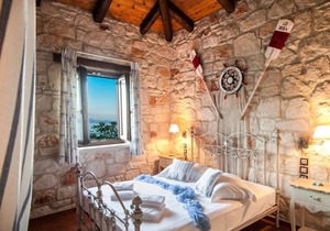 Kavos Psarou stone and wooden built sea front sea view traditional/lux villa