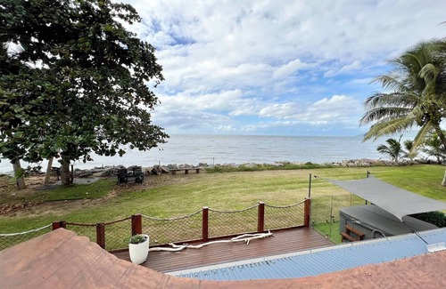 Flying Fish Point House | Absolute Ocean Front with rooftop Ocean views.