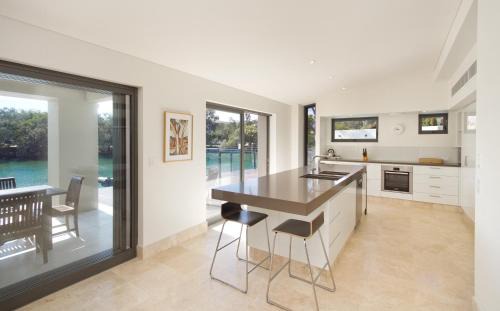 Noosa Heads House | Canalfront Retreat, Private Jetty & Pool