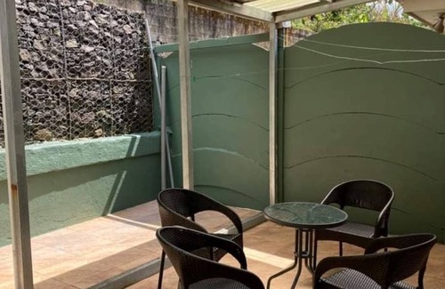Grecia House | Charming 2-bedroom house with AC and WiFi in a quaint neighborhood.