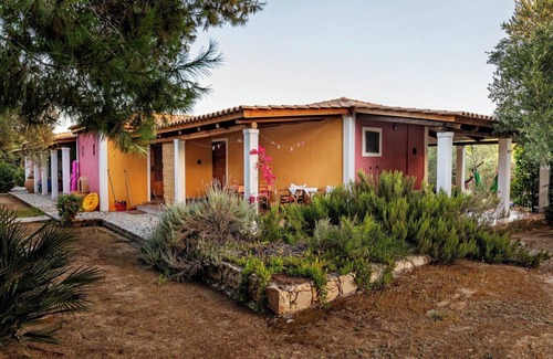 Vasilikos Cottage | Cosy cottage with large veranda and garden with hammock near the beach.