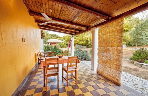 Vasilikos Cottage | Cosy cottage with large veranda and garden with hammock near the beach.
