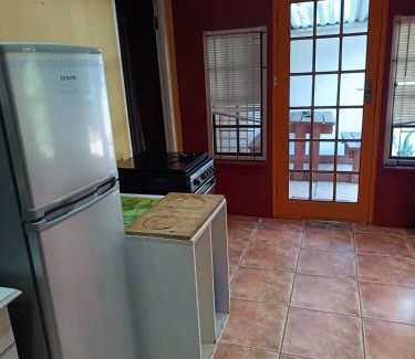 Ethekwini Apartment | Ground Floor apartment-2 x single beds, TV,kitchen, own bathroom, patio