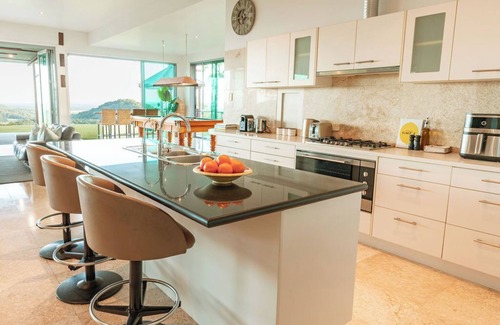 Verrierdale House | Ocean views. Close to Coolum Beach. Pet friendly. Firepit. Sleeps 11.