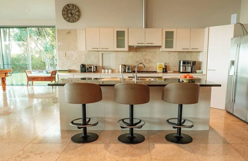 Verrierdale House | Ocean views. Close to Coolum Beach. Pet friendly. Firepit. Sleeps 11.
