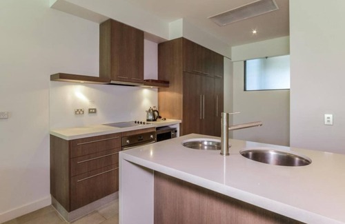 Palm Cove Apartment | Orchid at Temple Resort Waterfront Tropical Oasis