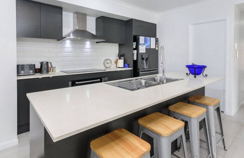 Bongaree House | Relax Poolside by the Canal