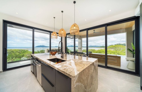 Tamarindo House | Spacious estate in enjoyable Playa Langosta with AC, fitness room, WiFi