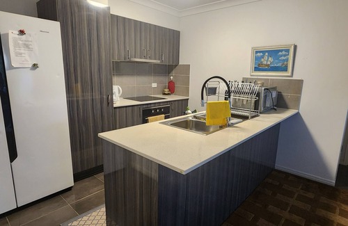 Upper Coomera House | Walk to shops and restaurants, with theme parks at your doorstep!
