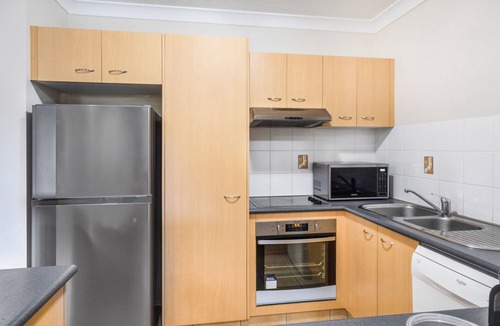 Mermaid Beach Apartment | 2-Bed Family Haven with Pools, BBQ & Playgrounds