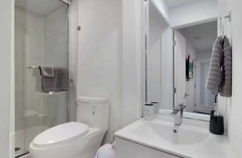 Ladner House | A small studio with a large backyard patio.