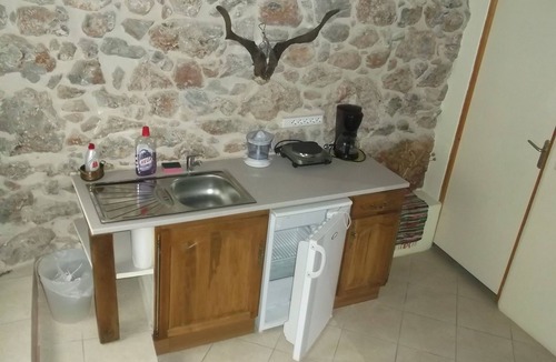 Leonidio House | At the foot of the red cliff. Leonidio. Greece.