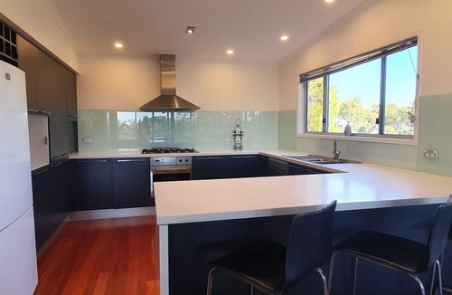 Rainbow Beach House | Beach home with a pool.
