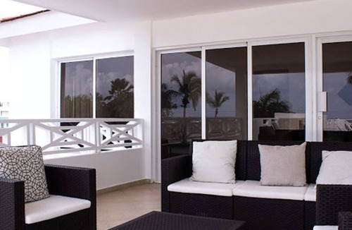 Puerto Bahia House | Beachfront Penthouse | Ocean View Jacuzzi