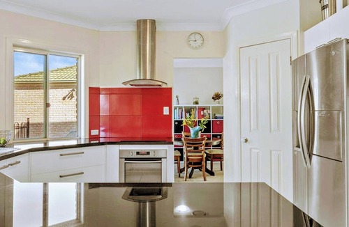 North Booval House | BEAUTIFUL 5 BEDROOM HOME WITH POOL, DUCTED AIR CONDITIONING, WIFI.LOTS OF ROOM