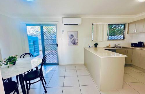 Mango Hill House | Calm Hideaway - Townhouse with Pool Access & Garage