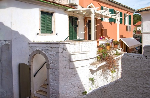 Lakka House | Charming Lakka Retreat: Angelina Apartment with A/C and Central Square Balcony