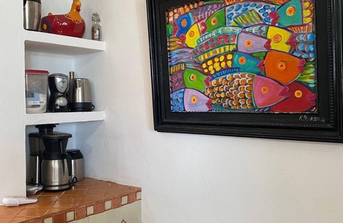Merida House | Charming single level beachfront home! Garden oasis & private waterfall pool.