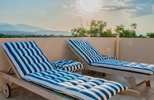 Aigialeia Apartment | Colorful maisonette A2 with sun terrace and pool close to the beach