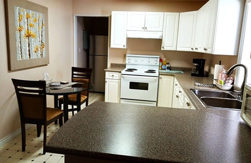 Broadmead House | Comfortable ground level suite with large yard access.