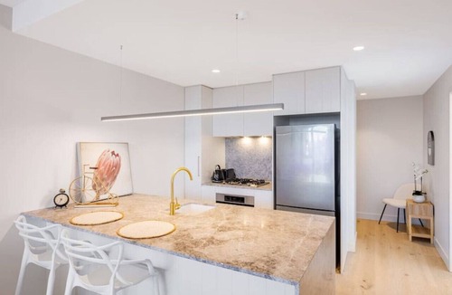 Milton Apartment | Conveniently located 2BR apt w/rooftop pool @Milt