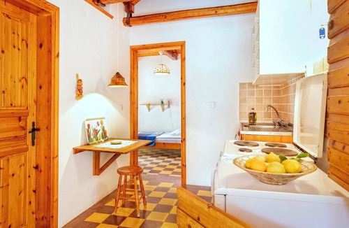 Vasilikos Cottage | Cosy cottage with large veranda and garden with hammock near the beach.
