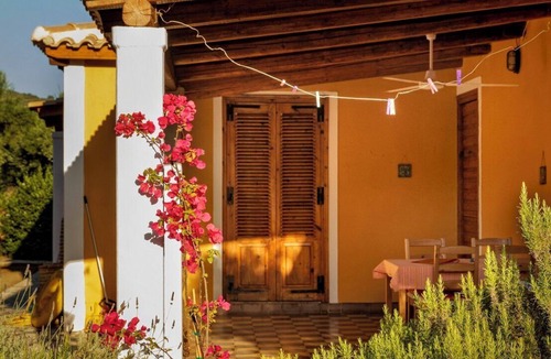 Vasilikos Cottage | Cosy cottage with large veranda and garden with hammock near the beach.