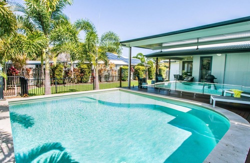 Agnes Water House | Dolphin Cove Agnes Water holiday home with pool & boat parking