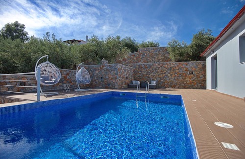 Nimfea Villa | Enjoy the private pool at fully equipped, modern beach house.