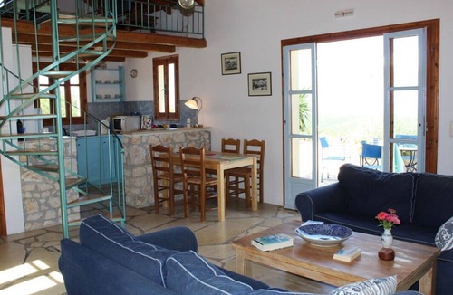 Chalikeri House | Exceptional sea views from this delightful villa nestled into the hillside.
