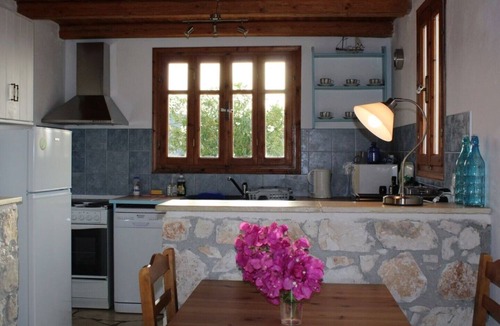 Chalikeri House | Exceptional sea views from this delightful villa nestled into the hillside.