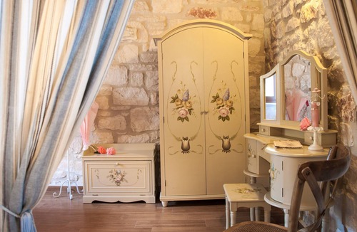 Psarou Villa | Kavos Psarou stone and wooden built sea front sea view traditional/lux villa