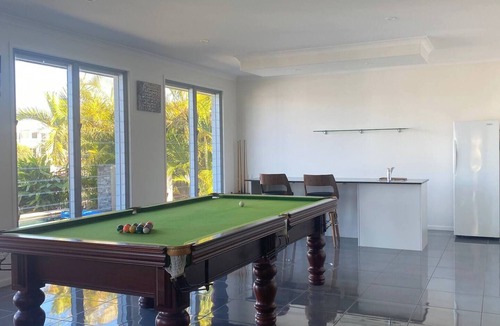 Banksia Beach House | Luxury canal home with pontoon and pool. Direct access to Pumicestone passage.
