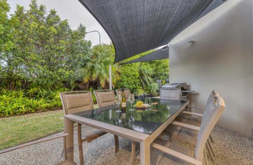 Pelican Waters House | Luxury resort style villa pool by Custom Bnb Hosting
