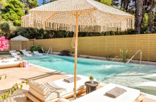 Koukounaries Hotel | Mandraki Village Boutique Hotel