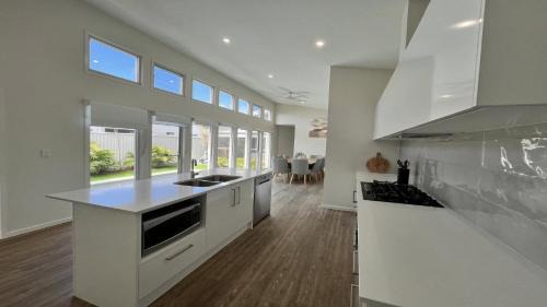 Pelican Waters House | Marina View
