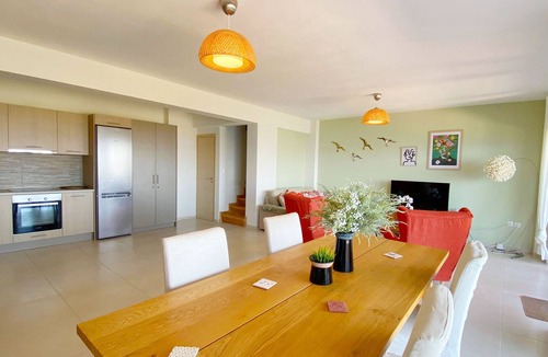 Kontos Condo | Minimalist, new condo with beautiful sea and mountain views