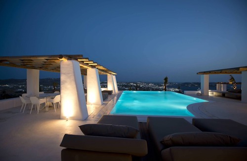 Tourlos Villa | My Rental Homes - Villa Opallia with spacious living and dining areas and a pool