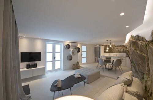 Tourlos Villa | My Rental Homes - Villa Opallia with spacious living and dining areas and a pool