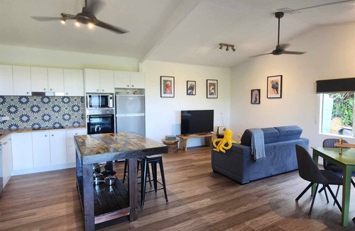 Miallo Cottage | NEW -The Sugar Shack, Ocean views over cane fields from your outdoor Spa Bath
