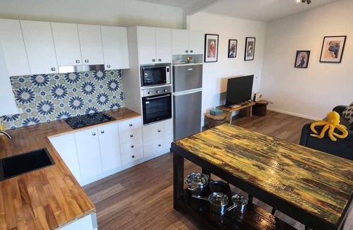 Miallo Cottage | NEW -The Sugar Shack, Ocean views over cane fields from your outdoor Spa Bath