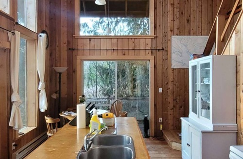 Sliammon Cabin | Ocean Views & Sunset Beach Cabin with soaker tub & fire pit