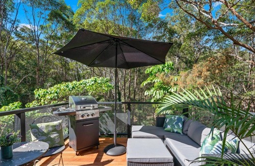 Tinbeerwah Resort | Orchid villa is decorated in Asian inspired décor with timber throughout
