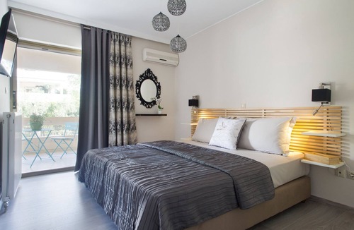 Voula Apartment | Promenade Apartment bright and elegant , located in the heart of Athens Riviera.